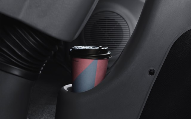 Center fascia lower cup holder